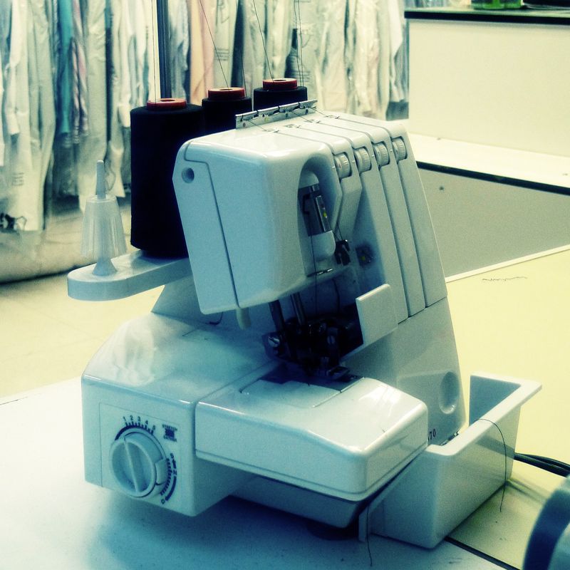 A photo of some kind of sewing machine in a London dry cleaners