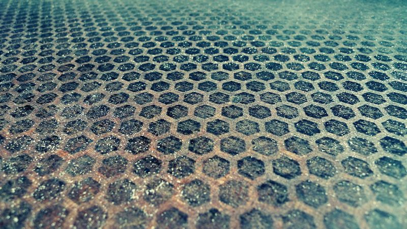 A photo of a honeycomb textured slip mat from a playground